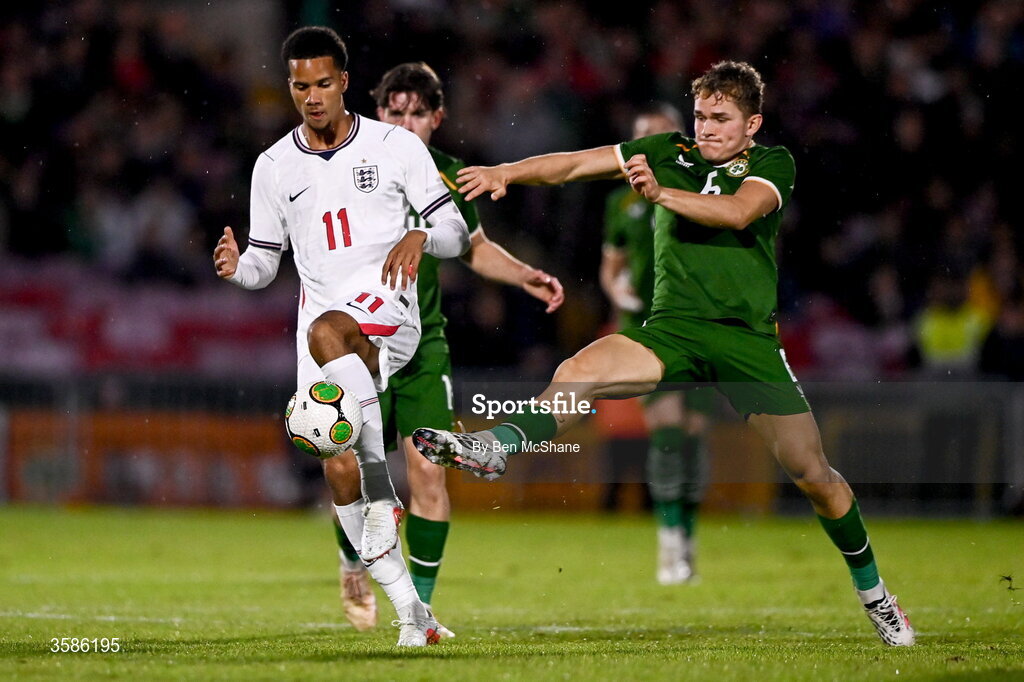 6 October 2026; Divine Mukasa of England in action against Jacob Devaney of Republic of Ireland during the UEFA European U21 Championship qualifier match between the Republic of Ireland and England at Turner's Cross Stadium in Cork. Photo by Ben McShane/Sportsfile