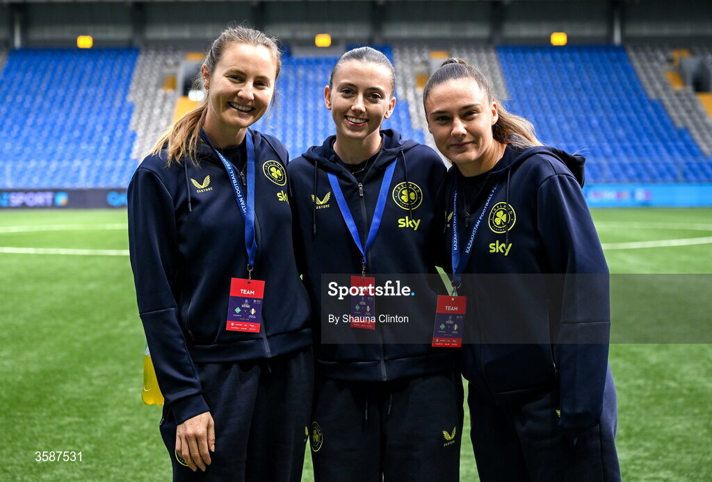 9 October 2026; Republic of Ireland players, from left, Kyra Carusa, Abbie Larkin and Jess Ziu before the 2027 FIFA Women’s World Cup qualifying round 1 play-off first leg match between Kazakhstan and the Republic of Ireland at Astana Arena in Kazakhstan. Photo by Shauna Clinton/Sportsfile