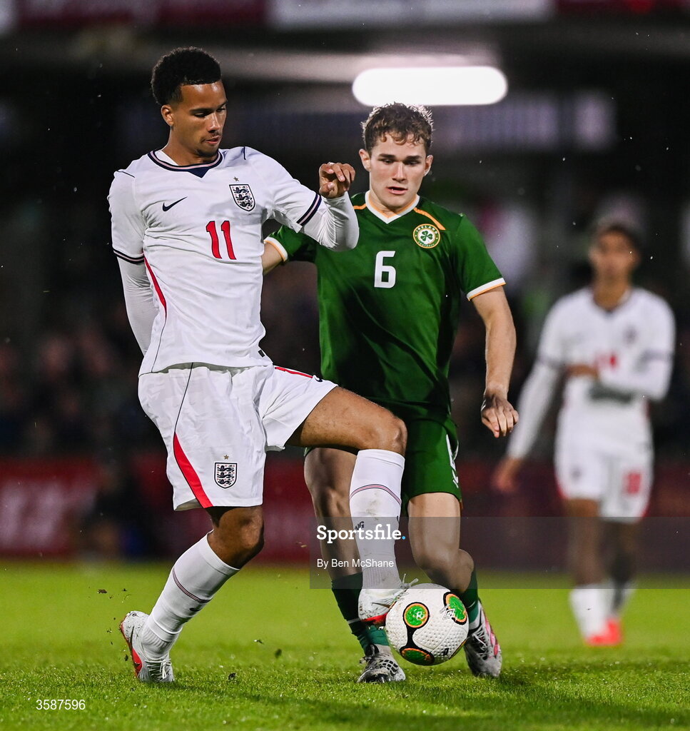 6 October 2026; Divine Mukasa of England and Jacob Devaney of Republic of Ireland during the UEFA European U21 Championship qualifier match between the Republic of Ireland and England at Turner's Cross Stadium in Cork. Photo by Ben McShane/Sportsfile