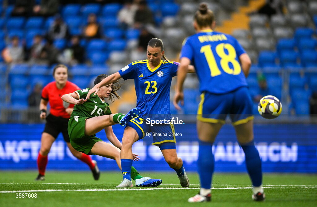 9 October 2026; Abbie Larkin of Republic of Ireland has a shot on goal despite the efforts of Anastassiya Vlassova of Kazakhstan during the 2027 FIFA Women’s World Cup qualifying round 1 play-off first leg match between Kazakhstan and the Republic of Ireland at Astana Arena in Kazakhstan. Photo by Shauna Clinton/Sportsfile
