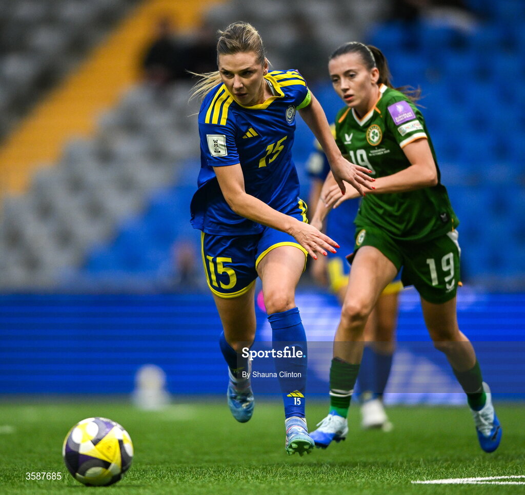9 October 2026; Yulia Myasnikova of Kazakhstan in action against Abbie Larkin of Republic of Ireland during the 2027 FIFA Women’s World Cup qualifying round 1 play-off first leg match between Kazakhstan and the Republic of Ireland at Astana Arena in Kazakhstan. Photo by Shauna Clinton/Sportsfile