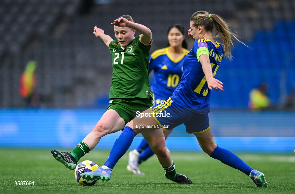 9 October 2026; Emily Murphy of Republic of Ireland is tackled by Yulia Myasnikova of Kazakhstan during the 2027 FIFA Women’s World Cup qualifying round 1 play-off first leg match between Kazakhstan and the Republic of Ireland at Astana Arena in Kazakhstan. Photo by Shauna Clinton/Sportsfile
