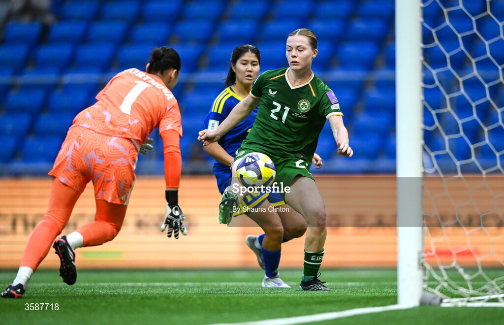 9 October 2026; Emily Murphy of Republic of Ireland shoots to score her side's fourth goal as Kazakhstan goalkeeper Angelina Portnova attempts to make a save during the 2027 FIFA Women’s World Cup qualifying round 1 play-off first leg match between Kazakhstan and the Republic of Ireland at Astana Arena in Kazakhstan. Photo by Shauna Clinton/Sportsfile
