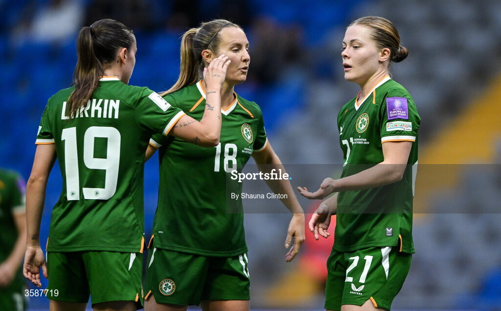 9 October 2026; Emily Murphy of Republic of Ireland, right, celebrates with team-mates, Abbie Larkin, left, and Kyra Carusa after scoring their side's fourth goal during the 2027 FIFA Women’s World Cup qualifying round 1 play-off first leg match between Kazakhstan and the Republic of Ireland at Astana Arena in Kazakhstan. Photo by Shauna Clinton/Sportsfile