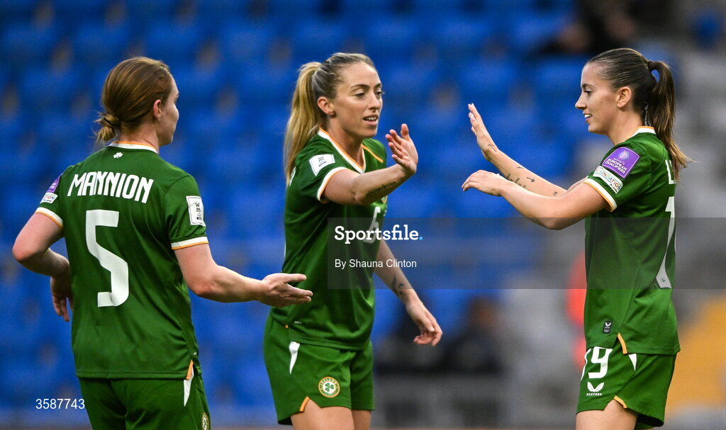 9 October 2026; Abbie Larkin of Republic of Ireland, right, celebrates with team-mates Aoife Mannion, left, and Megan Connolly after scoring their side's fifth goal during the 2027 FIFA Women’s World Cup qualifying round 1 play-off first leg match between Kazakhstan and the Republic of Ireland at Astana Arena in Kazakhstan. Photo by Shauna Clinton/Sportsfile