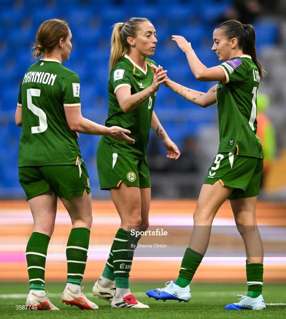 9 October 2026; Abbie Larkin of Republic of Ireland, right, celebrates with team-mates Aoife Mannion, left, and Megan Connolly after scoring their side's fifth goal during the 2027 FIFA Women’s World Cup qualifying round 1 play-off first leg match between Kazakhstan and the Republic of Ireland at Astana Arena in Kazakhstan. Photo by Shauna Clinton/Sportsfile