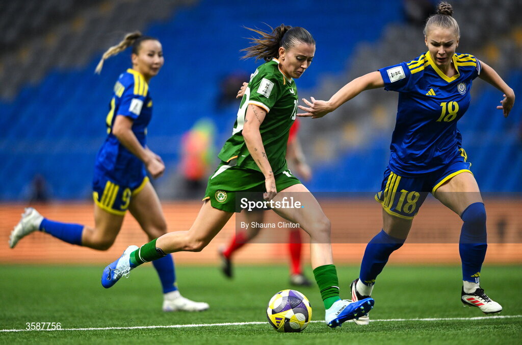 9 October 2026; Abbie Larkin of Republic of Ireland in action against Alexandra Burova of Kazakhstan during the 2027 FIFA Women’s World Cup qualifying round 1 play-off first leg match between Kazakhstan and the Republic of Ireland at Astana Arena in Kazakhstan. Photo by Shauna Clinton/Sportsfile
