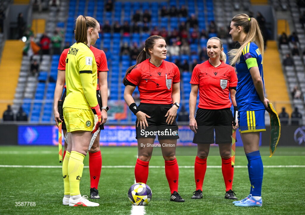 9 October 2026; Captains Courtney Brosnan of Republic of Ireland and Yulia Myasnikova of Kazakhstan with referee Karoline Marie Jensen before the 2027 FIFA Women’s World Cup qualifying round 1 play-off first leg match between Kazakhstan and the Republic of Ireland at Astana Arena in Kazakhstan. Photo by Shauna Clinton/Sportsfile
