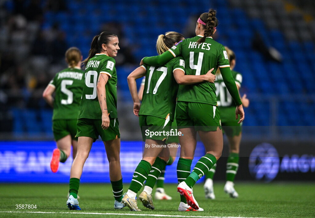 9 October 2026; Jamie Finn of Republic of Ireland, centre, celebrates with team-mate Caitlin Hayes, 4, and Abbie Larkin after scoring their side's sixth goal during the 2027 FIFA Women’s World Cup qualifying round 1 play-off first leg match between Kazakhstan and the Republic of Ireland at Astana Arena in Kazakhstan. Photo by Shauna Clinton/Sportsfile
