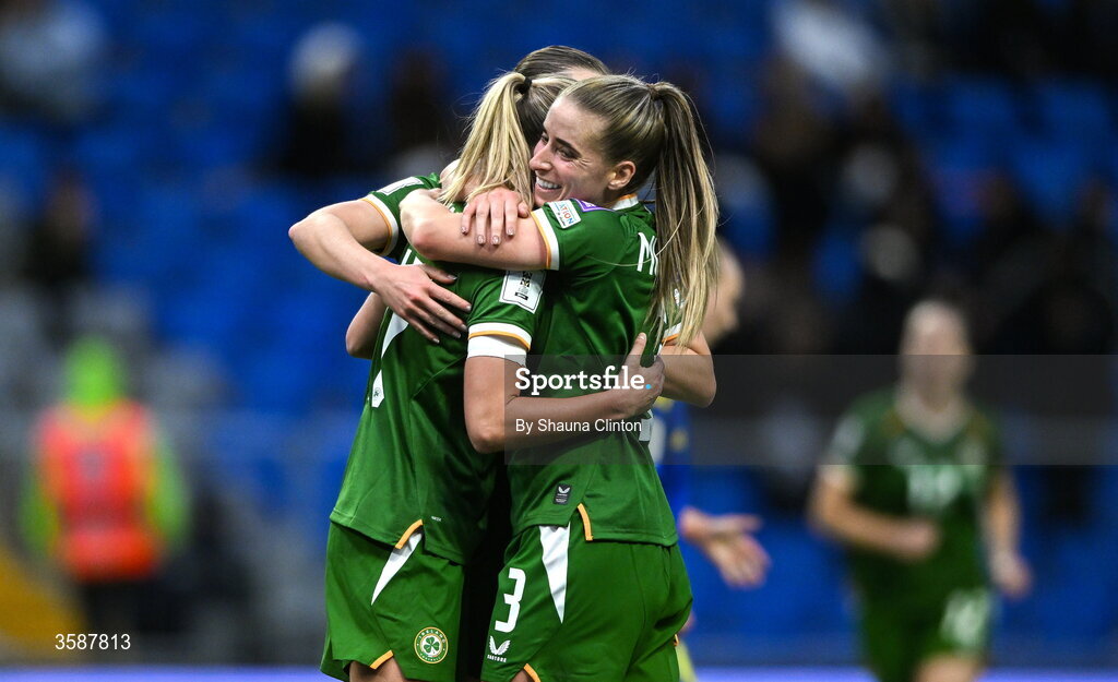 9 October 2026; Jamie Finn of Republic of Ireland, centre, celebrates with team-mate Chloe Mustaki, right, after scoring their side's sixth goal during the 2027 FIFA Women’s World Cup qualifying round 1 play-off first leg match between Kazakhstan and the Republic of Ireland at Astana Arena in Kazakhstan. Photo by Shauna Clinton/Sportsfile