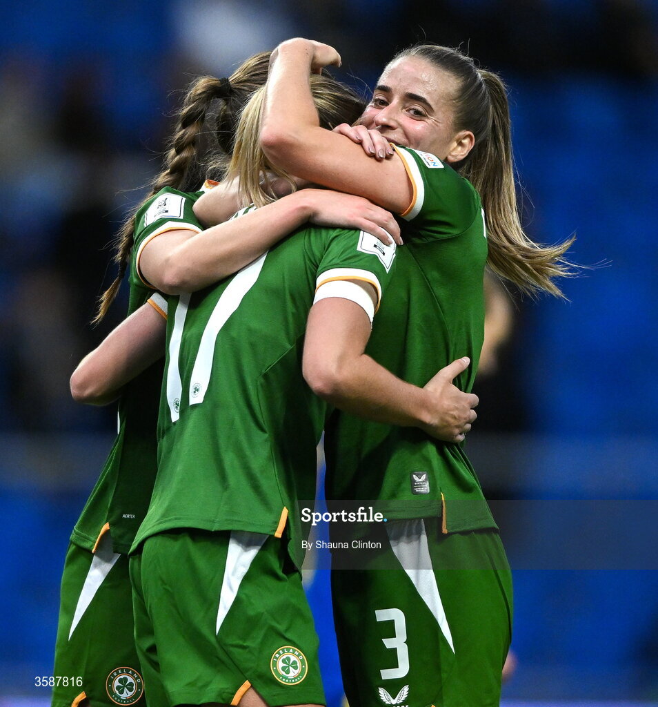 9 October 2026; Jamie Finn of Republic of Ireland, centre, celebrates with team-mate Chloe Mustaki, right, after scoring their side's sixth goal during the 2027 FIFA Women’s World Cup qualifying round 1 play-off first leg match between Kazakhstan and the Republic of Ireland at Astana Arena in Kazakhstan. Photo by Shauna Clinton/Sportsfile