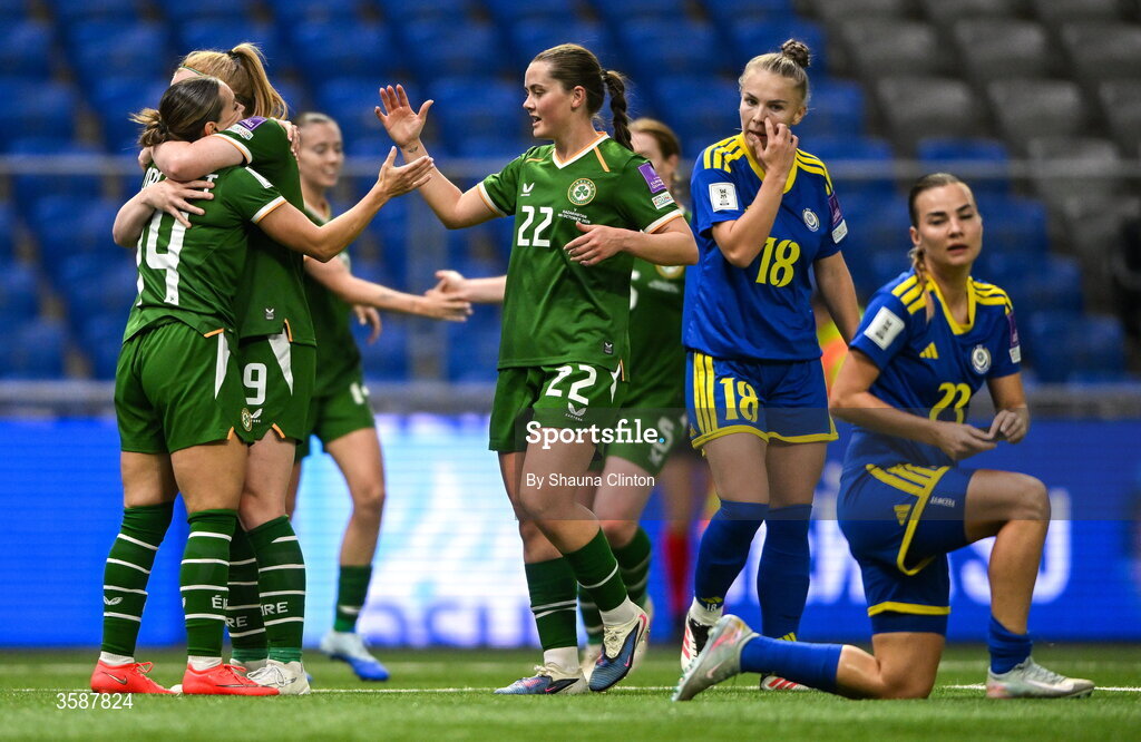 9 October 2026; Shanade Hopcroft of Republic of Ireland, left,celebrates with team-mates Amber Barrett, centre, and Tyler Toland after scoring their side's seventh goal during the 2027 FIFA Women’s World Cup qualifying round 1 play-off first leg match between Kazakhstan and the Republic of Ireland at Astana Arena in Kazakhstan. Photo by Shauna Clinton/Sportsfile