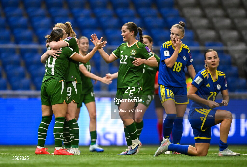 9 October 2026; Shanade Hopcroft of Republic of Ireland, left,celebrates with team-mates Amber Barrett, centre, and Tyler Toland after scoring their side's seventh goal during the 2027 FIFA Women’s World Cup qualifying round 1 play-off first leg match between Kazakhstan and the Republic of Ireland at Astana Arena in Kazakhstan. Photo by Shauna Clinton/Sportsfile