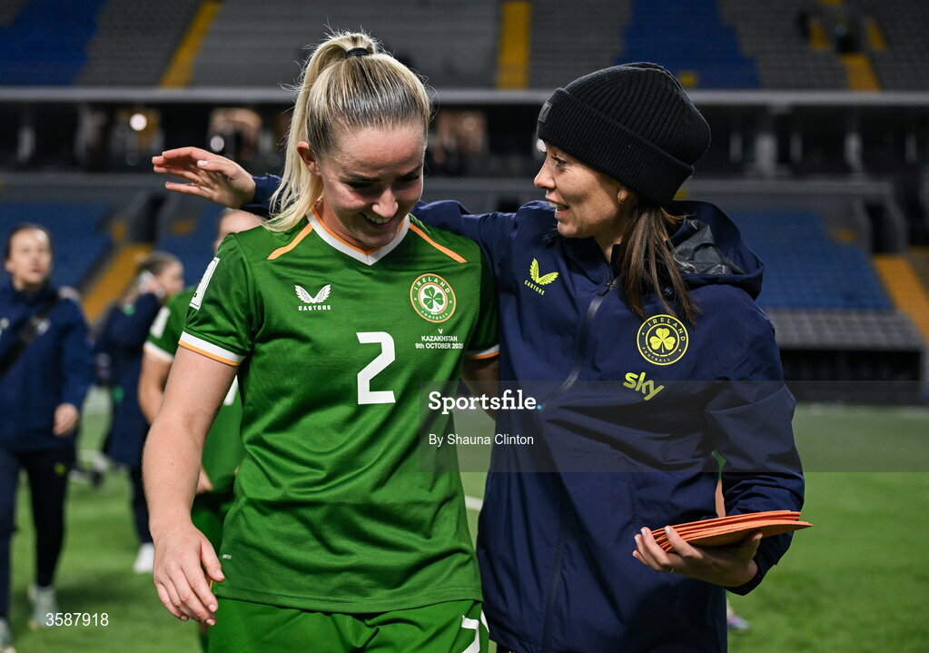 9 October 2026; Jessie Stapleton of Republic of Ireland, left, with Republic of Ireland assistant coach Amber Whiteley after the 2027 FIFA Women’s World Cup qualifying round 1 play-off first leg match between Kazakhstan and the Republic of Ireland at Astana Arena in Kazakhstan. Photo by Shauna Clinton/Sportsfile