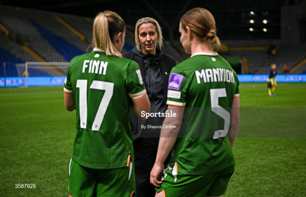 9 October 2026; Republic of Ireland head coach Carla Ward with Jamie Finn, left, and Aoife Mannion after the 2027 FIFA Women’s World Cup qualifying round 1 play-off first leg match between Kazakhstan and the Republic of Ireland at Astana Arena in Kazakhstan. Photo by Shauna Clinton/Sportsfile