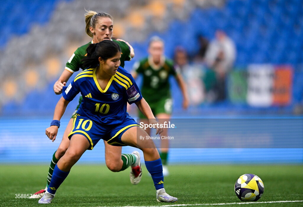 9 October 2026; Megan Connolly of Republic of Ireland in action against Amina Bibossynova of Kazakhstan during the 2027 FIFA Women’s World Cup qualifying round 1 play-off first leg match between Kazakhstan and the Republic of Ireland at Astana Arena in Kazakhstan. Photo by Shauna Clinton/Sportsfile