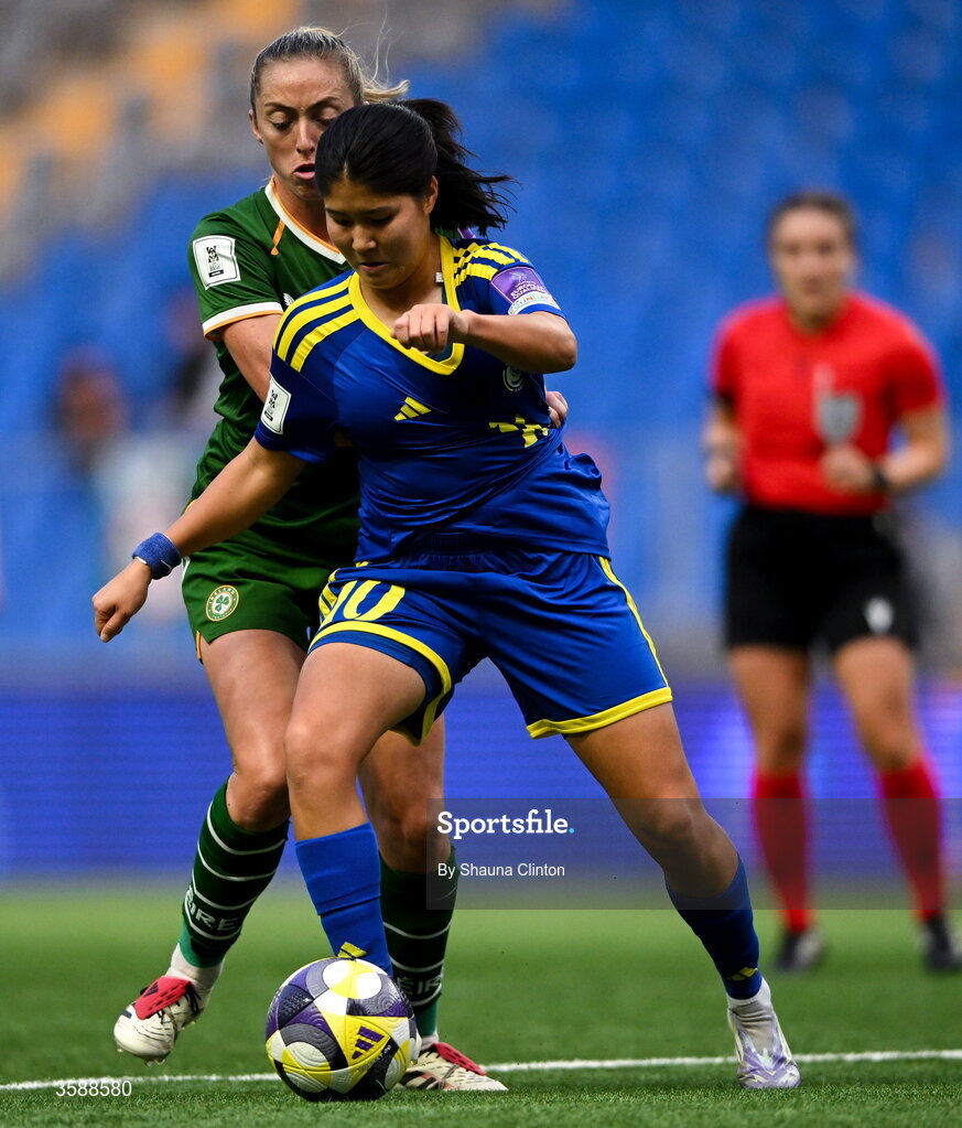 9 October 2026; Megan Connolly of Republic of Ireland in action against Amina Bibossynova of Kazakhstan during the 2027 FIFA Women’s World Cup qualifying round 1 play-off first leg match between Kazakhstan and the Republic of Ireland at Astana Arena in Kazakhstan. Photo by Shauna Clinton/Sportsfile