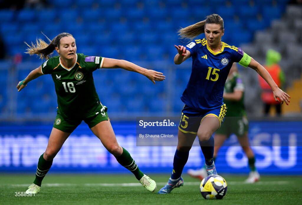 9 October 2026; Kyra Carusa of Republic of Ireland in action against Yulia Myasnikova of Kazakhstan during the 2027 FIFA Women’s World Cup qualifying round 1 play-off first leg match between Kazakhstan and the Republic of Ireland at Astana Arena in Kazakhstan. Photo by Shauna Clinton/Sportsfile