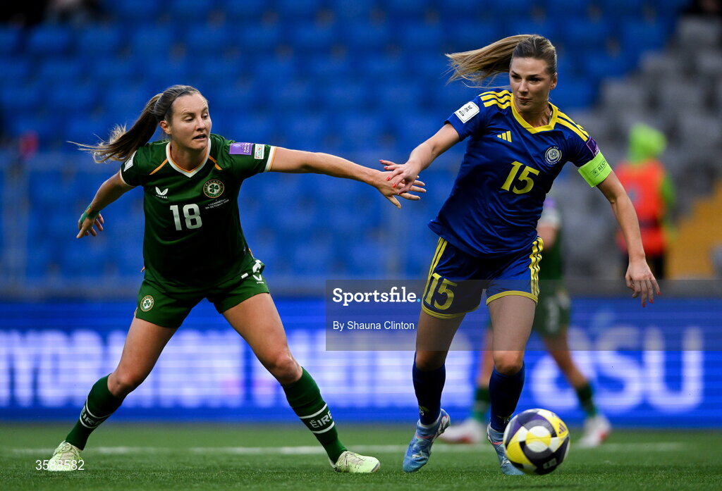 9 October 2026; Kyra Carusa of Republic of Ireland in action against Yulia Myasnikova of Kazakhstan during the 2027 FIFA Women’s World Cup qualifying round 1 play-off first leg match between Kazakhstan and the Republic of Ireland at Astana Arena in Kazakhstan. Photo by Shauna Clinton/Sportsfile