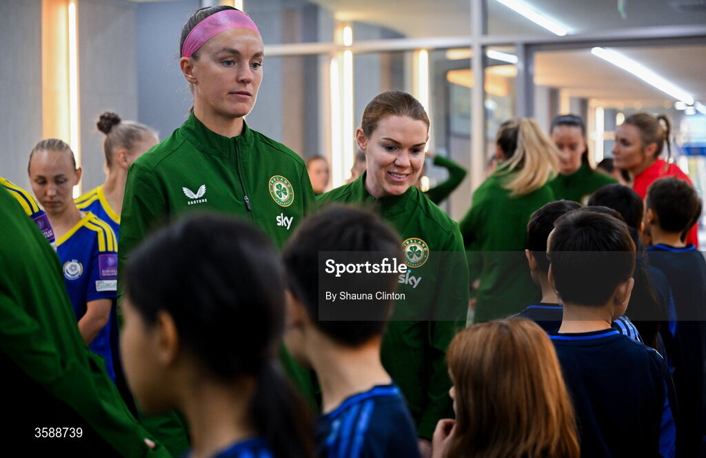 9 October 2026; Republic of Ireland players Caitlin Hayes, left, an Aoife Mannion with mascots before the 2027 FIFA Women’s World Cup qualifying round 1 play-off first leg match between Kazakhstan and the Republic of Ireland at Astana Arena in Kazakhstan. Photo by Shauna Clinton/Sportsfile