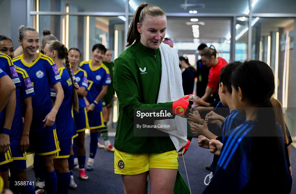 9 October 2026; Republic of Ireland goalkeeper Courtney Brosnan with mascots before the 2027 FIFA Women’s World Cup qualifying round 1 play-off first leg match between Kazakhstan and the Republic of Ireland at Astana Arena in Kazakhstan. Photo by Shauna Clinton/Sportsfile