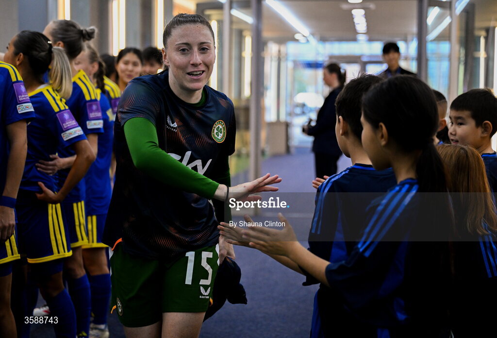 9 October 2026; Lucy Quinn of Republic of Ireland with mascots before the 2027 FIFA Women’s World Cup qualifying round 1 play-off first leg match between Kazakhstan and the Republic of Ireland at Astana Arena in Kazakhstan. Photo by Shauna Clinton/Sportsfile