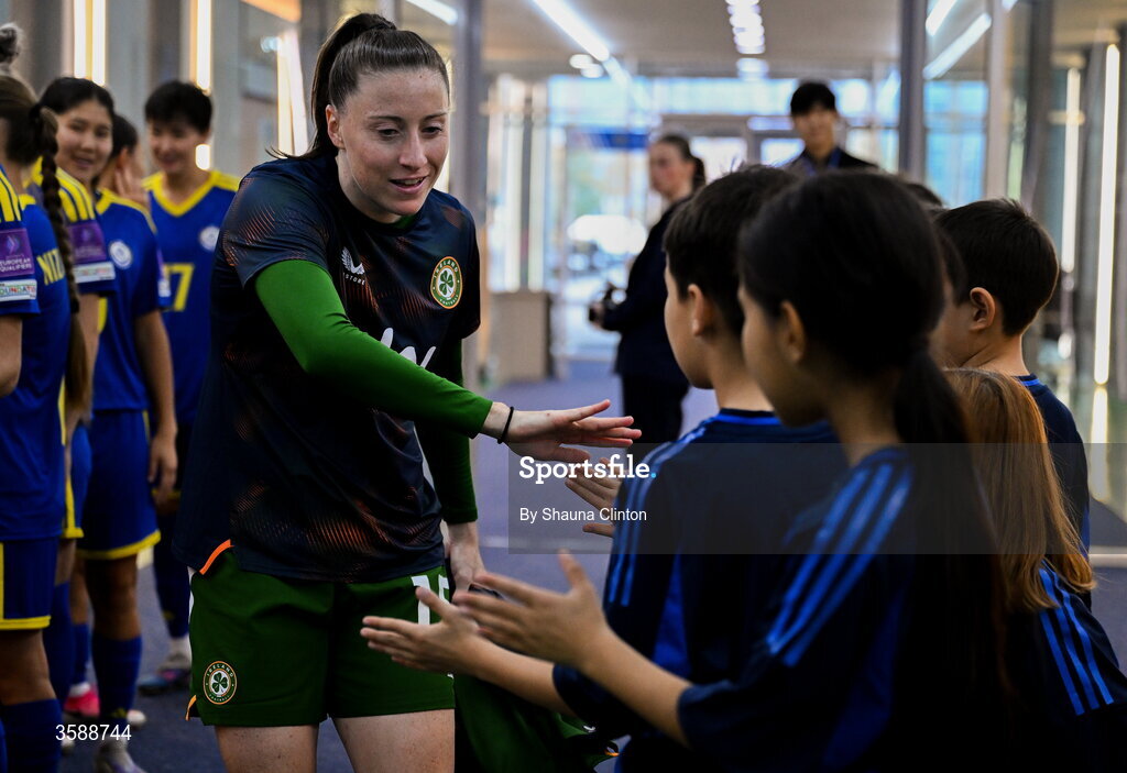 9 October 2026; Lucy Quinn of Republic of Ireland with mascots before the 2027 FIFA Women’s World Cup qualifying round 1 play-off first leg match between Kazakhstan and the Republic of Ireland at Astana Arena in Kazakhstan. Photo by Shauna Clinton/Sportsfile