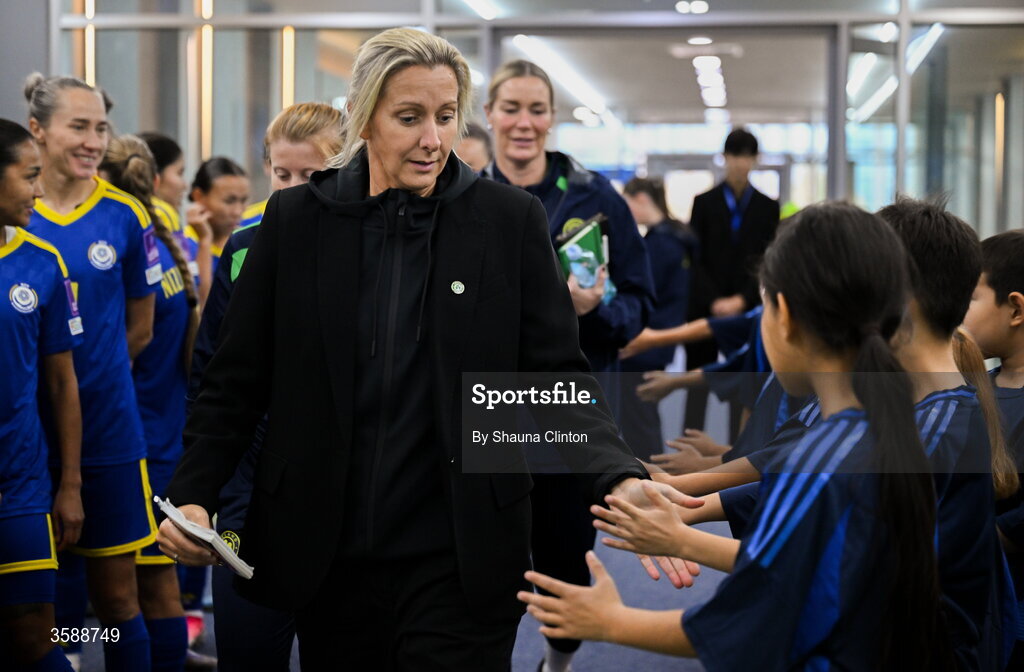 9 October 2026; Republic of Ireland head coach Carla Ward with mascots before the 2027 FIFA Women’s World Cup qualifying round 1 play-off first leg match between Kazakhstan and the Republic of Ireland at Astana Arena in Kazakhstan. Photo by Shauna Clinton/Sportsfile