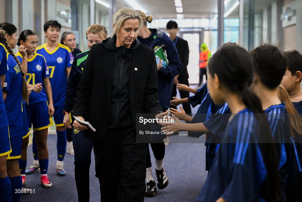 9 October 2026; Republic of Ireland head coach Carla Ward with mascots before the 2027 FIFA Women’s World Cup qualifying round 1 play-off first leg match between Kazakhstan and the Republic of Ireland at Astana Arena in Kazakhstan. Photo by Shauna Clinton/Sportsfile