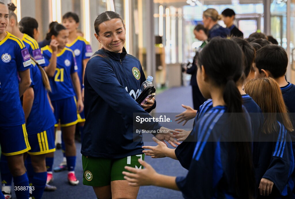9 October 2026; Shanade Hopcroft of Republic of Ireland with mascots before the 2027 FIFA Women’s World Cup qualifying round 1 play-off first leg match between Kazakhstan and the Republic of Ireland at Astana Arena in Kazakhstan. Photo by Shauna Clinton/Sportsfile