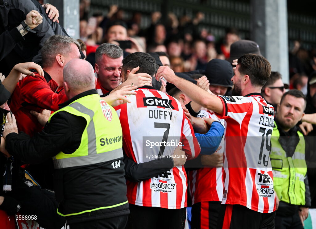 10 October 2026; Michael Duffy of Derry City celebrates with supporters after scoring his side's second goal during the Club Orange Men's FAI Cup semi-final match between Galway and Derry City at Eamonn Deacy Park in Galway. Photo by Stephen McCarthy/Sportsfile