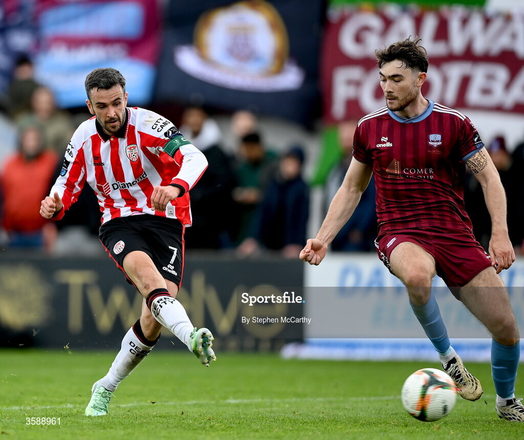 10 October 2026; Michael Duffy of Derry City scores his side's second goal despite the attention of Connor Barratt of Galway United during the Club Orange Men's FAI Cup semi-final match between Galway and Derry City at Eamonn Deacy Park in Galway. Photo by Stephen McCarthy/Sportsfile