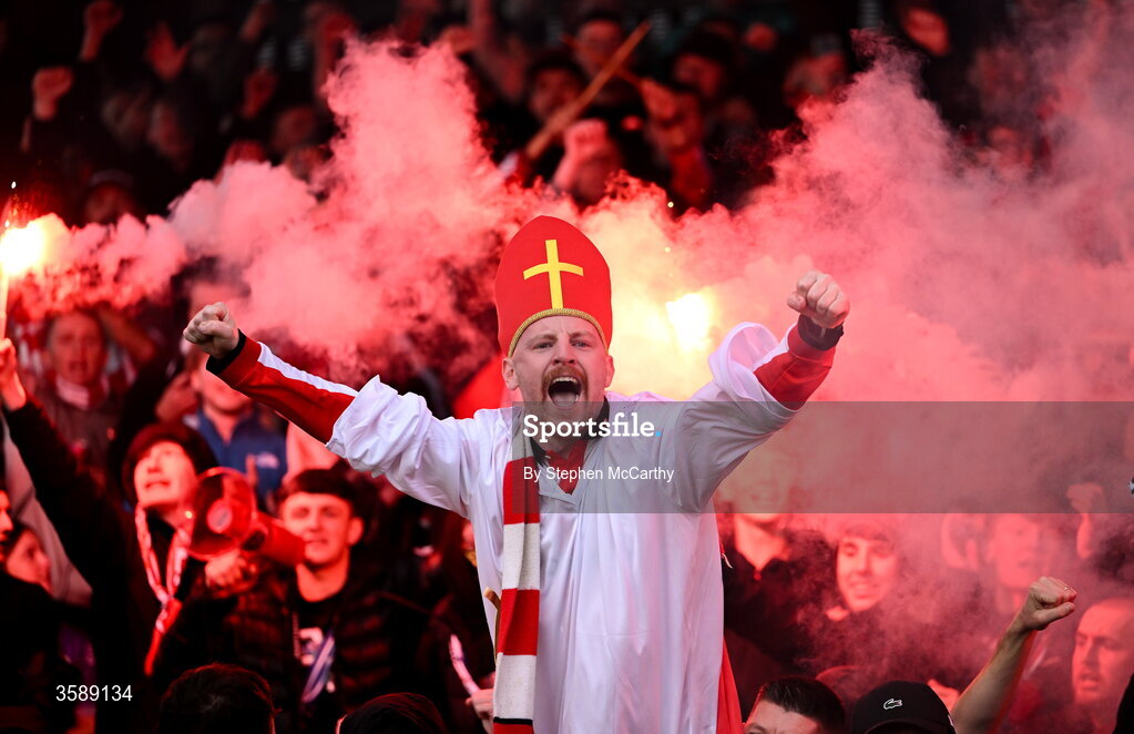 10 October 2026; A Derry City supporter celebrates following the Club Orange Men's FAI Cup semi-final match between Galway and Derry City at Eamonn Deacy Park in Galway. Photo by Stephen McCarthy/Sportsfile