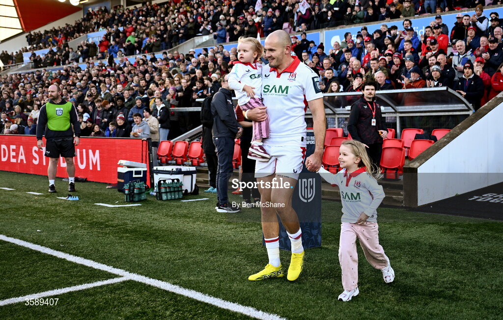 10 October 2026; Jacob Stockdale of Ulster makes his way out, for his 150th appearance, with his daughters Phoebe and Bonnie Kate before the United Rugby Championship match between Ulster and Munster at Affidea Stadium in Belfast. Photo by Ben McShane/Sportsfile