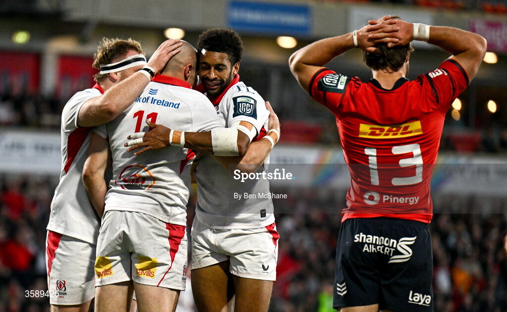 10 October 2026; Jacob Stockdale of Ulster celebrates with teammates Tom McAllister, left, and Rob Baloucoune after scoring their side's second try during the United Rugby Championship match between Ulster and Munster at Affidea Stadium in Belfast. Photo by Ben McShane/Sportsfile