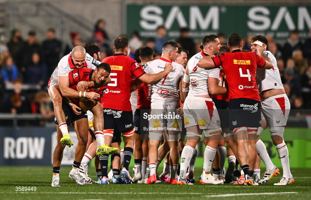 10 October 2026; Shay McCarthy of Munster jokingly gives Jacob Stockdale of Ulster a piggyback as their teammates tussle during the United Rugby Championship match between Ulster and Munster at Affidea Stadium in Belfast. Photo by Ben McShane/Sportsfile