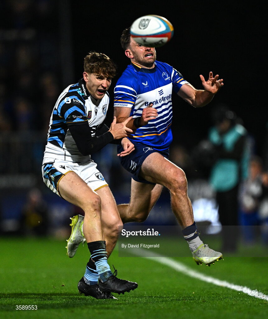 10 October 2026; Hugo Keenan of Leinster kicks past Matty Young of Cardiff on his way to scoring his side's first try during the United Rugby Championship match between Leinster and Cardiff at the Laya Arena in Dublin. Photo by David Fitzgerald/Sportsfile