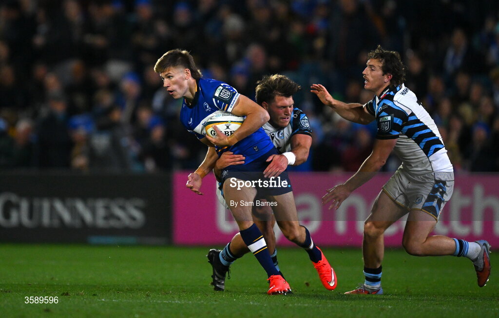 10 October 2026; Sam Prendergast of Leinster in action against Teddy Williams, left, and Le Roux Malan of Cardiff during the United Rugby Championship match between Leinster and Cardiff at the Laya Arena in Dublin. Photo by Sam Barnes/Sportsfile