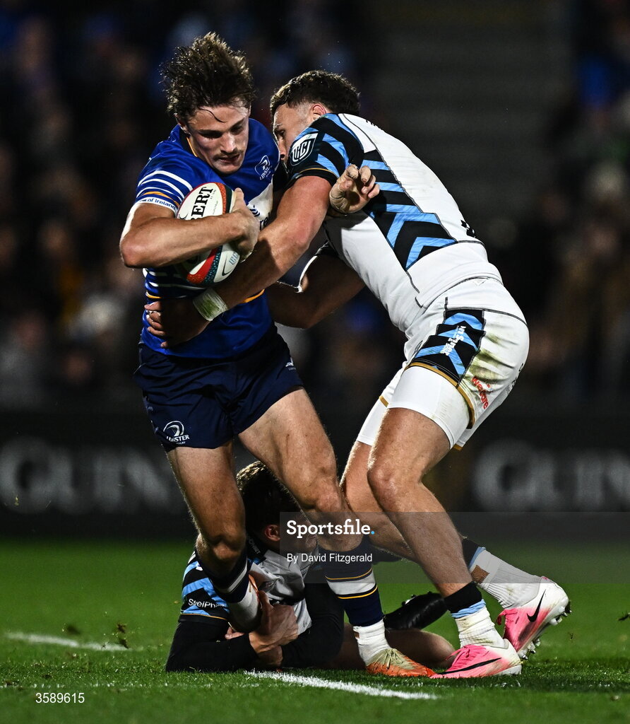 10 October 2026; Joshua Kenny of Leinster is tackled by Matty Young, left, and Mason Grady of Cardiff during the United Rugby Championship match between Leinster and Cardiff at the Laya Arena in Dublin. Photo by David Fitzgerald/Sportsfile