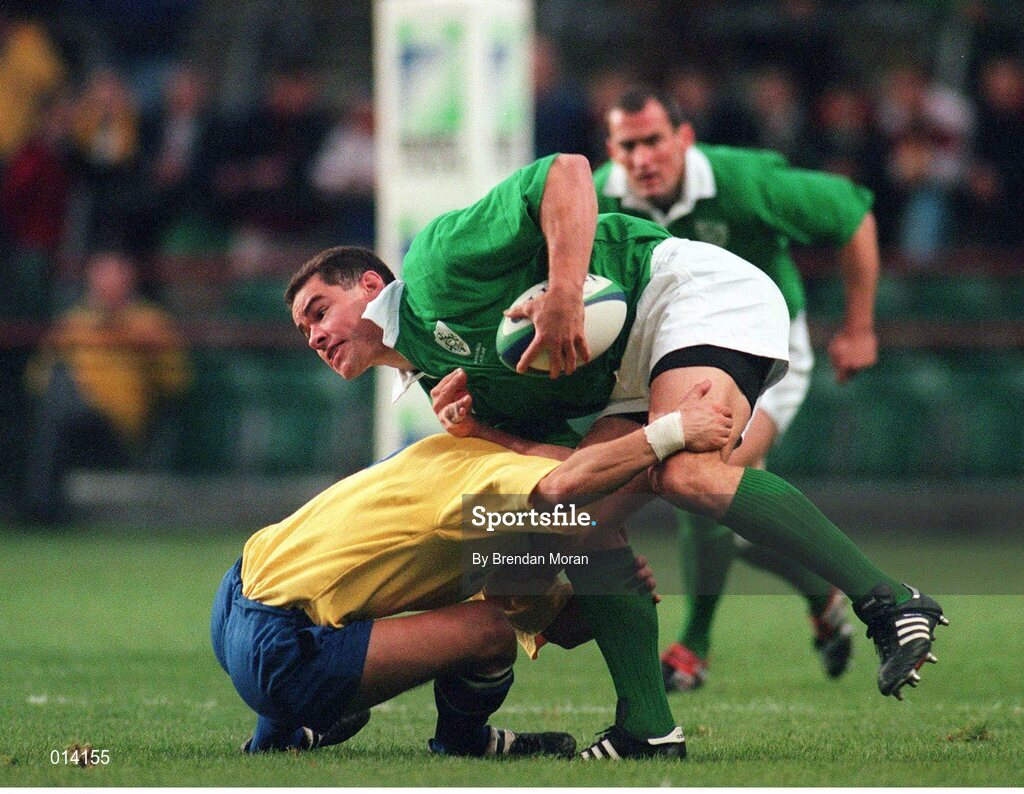 21 November 1998; Andy Ward, Ireland, is tackled by Roland Vusec, Romania. Rugby World Cup Qualifier, Ireland v Romania, Lansdowne Road, Dublin. Picture credit: Brendan Moran / SPORTSFILE