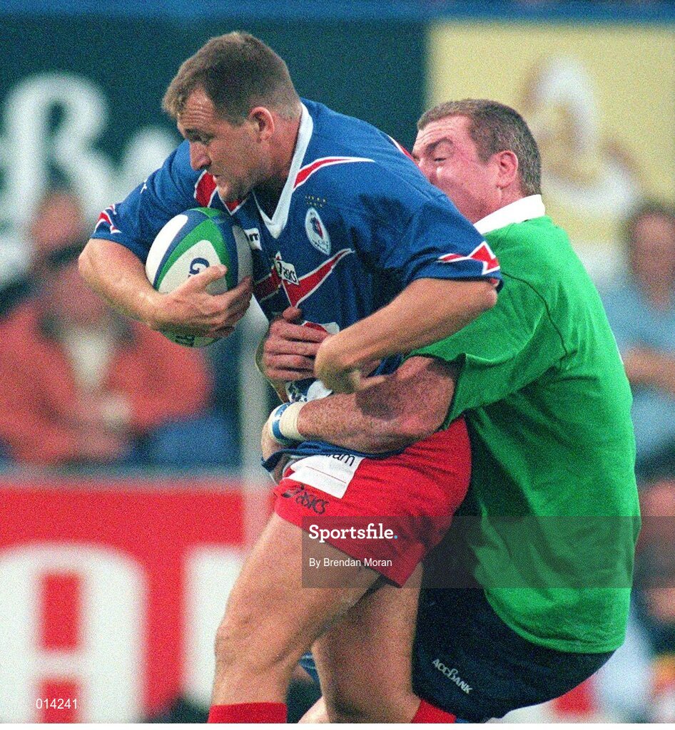 25 September1998; Cliff Mytton, Stade Francais, is tackled by Leinster's Victor Costello. European Rugby Cup, Leinster v Stade Francais, Donnybrook, Dublin. Picture credit: Brendan Moran / SPORTSFILE