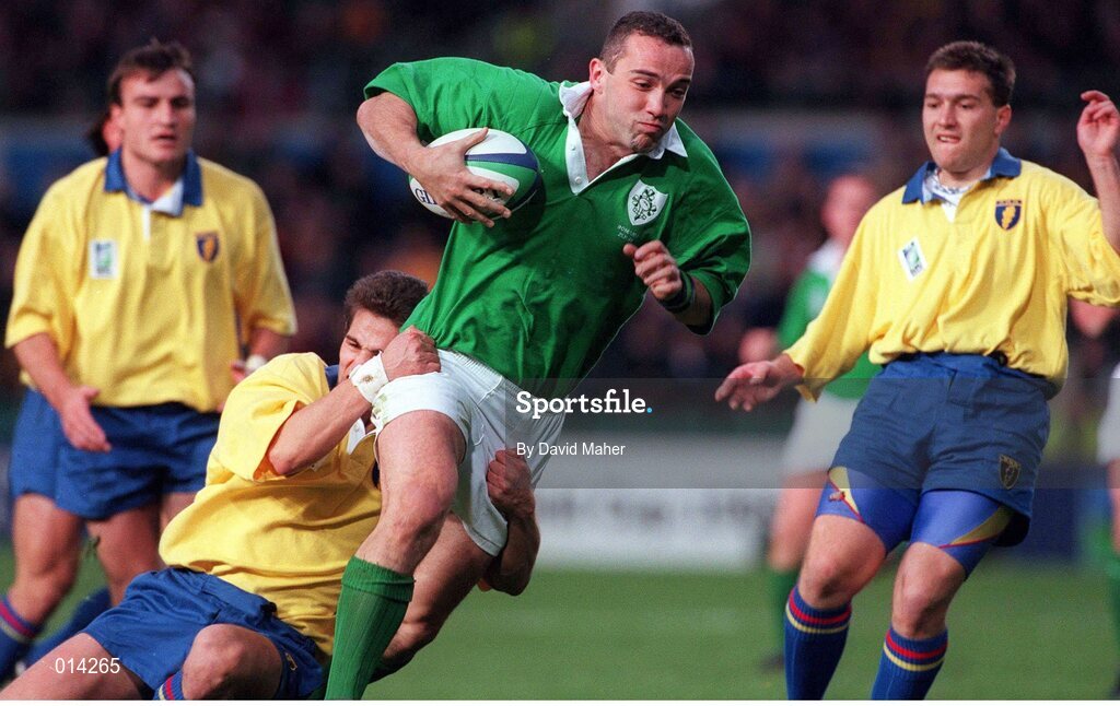 21 November 1998; Conor O'Shea, Ireland, goes past the tackle of Roland Vusec, Romania. Rugby World Cup Qualifier, Ireland v Romania, Lansdowne Road, Dublin. Picture credit: David Maher / SPORTSFILE