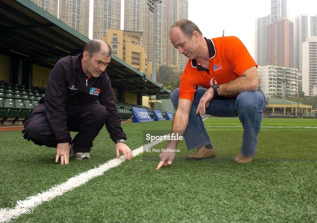 21 January 2005; Managers Mickey Harte, left, and John Maughan inspect the pitch before team training in advance of the 2004 Vodafone All-Stars Exhibition Game, 2003 Vodafone All-Stars v 2004 Vodafone All-Stars, Hong Kong Football Club, Hong Kong. Picture credit; Ray McManus / SPORTSFILE