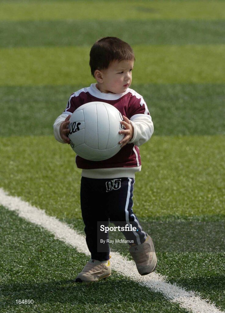 21 January 2005; Twenty month old Ciaran Delaney, from Hong Kong, relaxes before team training in advance of the 2004 Vodafone All-Stars Exhibition Game, 2003 Vodafone All-Stars v 2004 Vodafone All-Stars, Hong Kong Football Club, Hong Kong. Picture credit; Ray McManus / SPORTSFILE