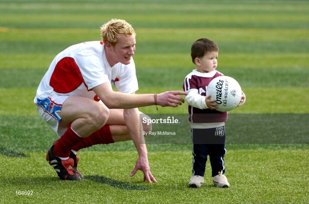 21 January 2005; Twenty month old Ciaran Delaney, from Hong Kong, and Padraig Clancy, Laios, before team training in advance of the 2004 Vodafone All-Stars Exhibition Game, 2003 Vodafone All-Stars v 2004 Vodafone All-Stars, Hong Kong Football Club, Hong Kong. Picture credit; Ray McManus / SPORTSFILE