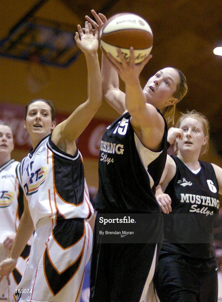 28 January 2005; Carrie Walker, Mustang Sally's St. Paul's, in action against Carmel Kissane, Dart Killester. National Cup, Senior Women's Semi-Final, Mustang Sally's St. Paul's, Killarney v Dart Killester, ESB Arena, Tallaght, Dublin. Picture credit; Brendan Moran / SPORTSFILE