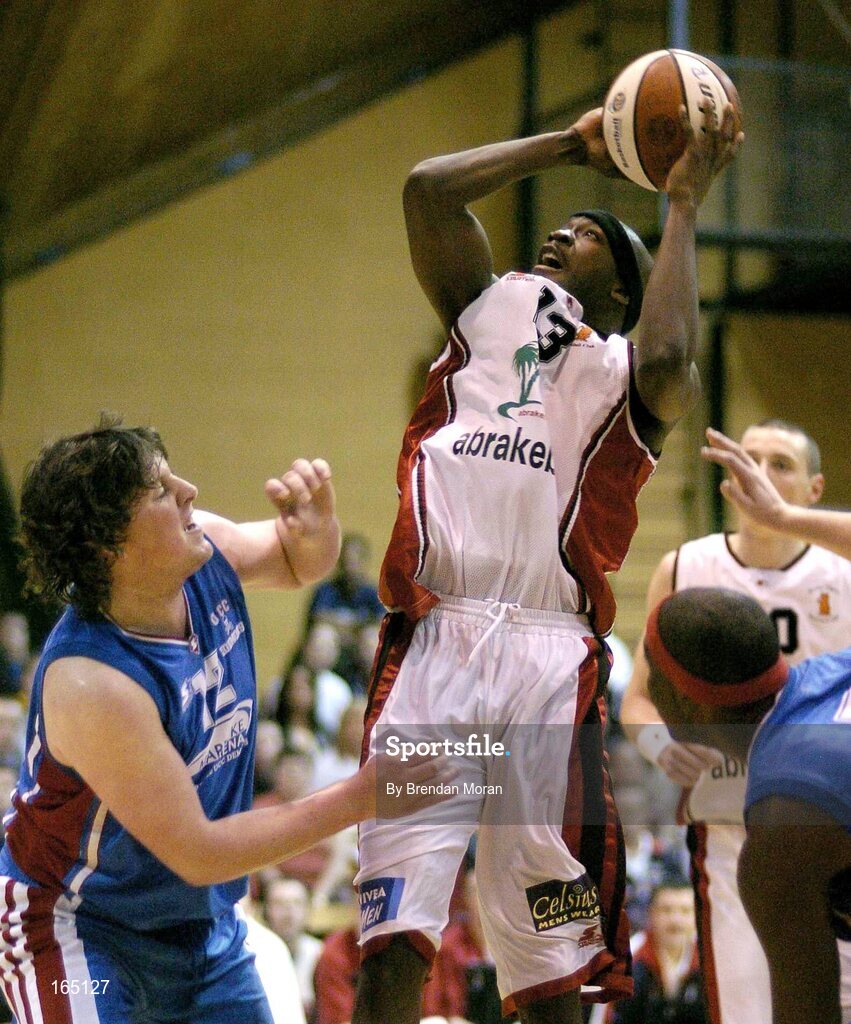 29 January 2005; Roy Smallwood, Abrakebabra Tigers, Tralee, in action against Niall O'Reily, Mardyke UCC Demons. National Cup, Senior Men's Semi-Final, Mardyke UCC Demons v Abrakebabra Tigers, Tralee, ESB Arena, Tallaght, Dublin. Picture credit; Brendan Moran / SPORTSFILE