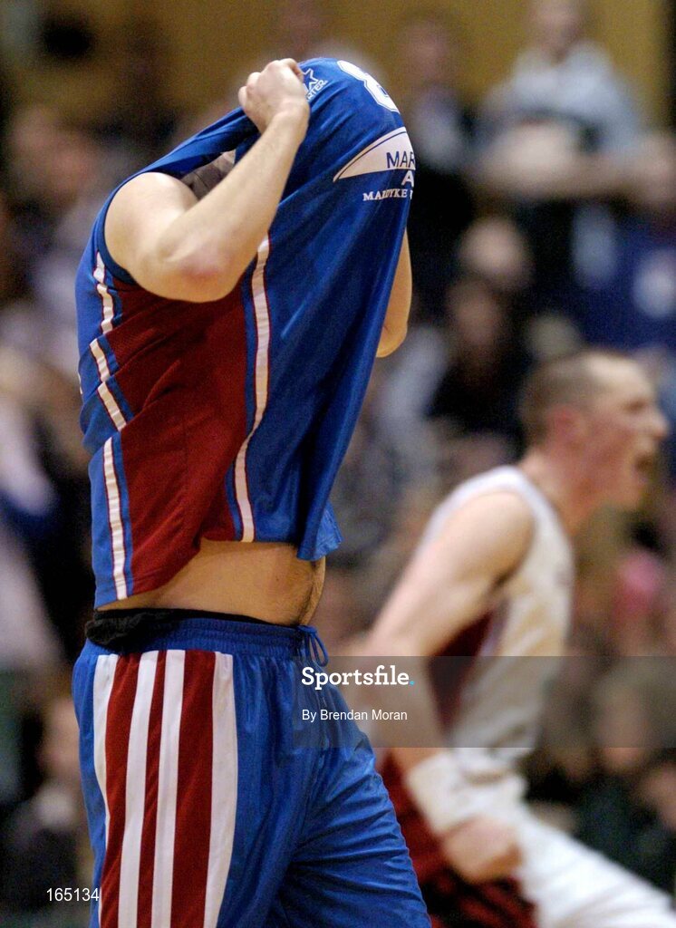 29 January 2005; A dejected Shane Coughlan, Mardyke UCC Demons, at the final whistle after defeat to Abrakebabra Tigers, Tralee. National Cup, Senior Men's Semi-Final, Mardyke UCC Demons v Abrakebabra Tigers, Tralee, ESB Arena, Tallaght, Dublin. Picture credit; Brendan Moran / SPORTSFILE