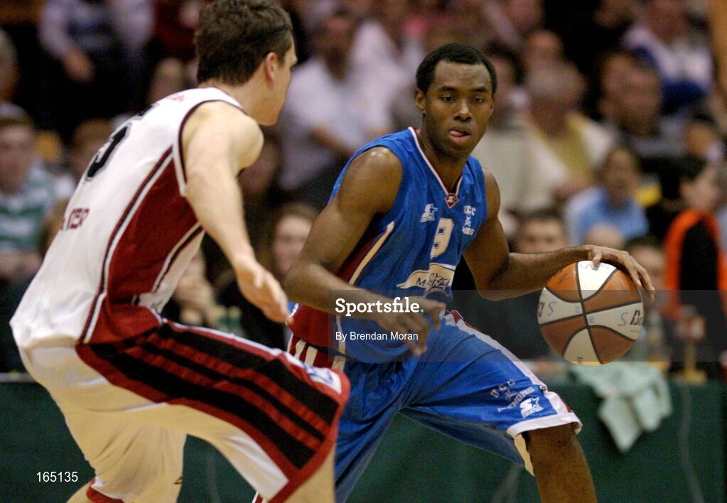 29 January 2005; Patrick Pope, Mardyke UCC Demons, in action against Luke O'Hea, Abrakebabra Tigers, Tralee. National Cup, Senior Men's Semi-Final, Mardyke UCC Demons v Abrakebabra Tigers, Tralee, ESB Arena, Tallaght, Dublin. Picture credit; Brendan Moran / SPORTSFILE