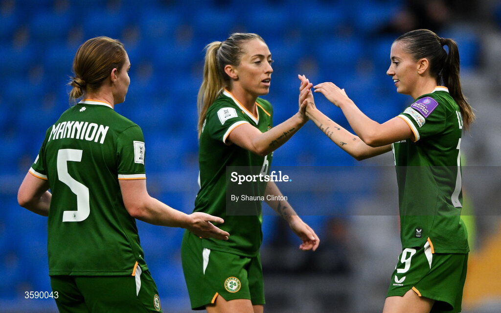 9 October 2026; Abbie Larkin of Republic of Ireland, right, celebrates with team-mates Aoife Mannion, left, and Megan Connolly, centre, during the 2027 FIFA Women’s World Cup qualifying round 1 play-off first leg match between Kazakhstan and the Republic of Ireland at Astana Arena in Kazakhstan. Photo by Shauna Clinton/Sportsfile